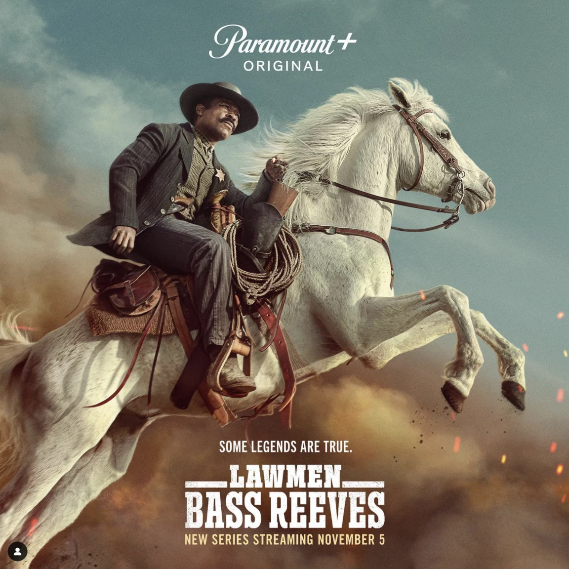 Key art for Bass Reeves riding a rearing white horse by Paramount+